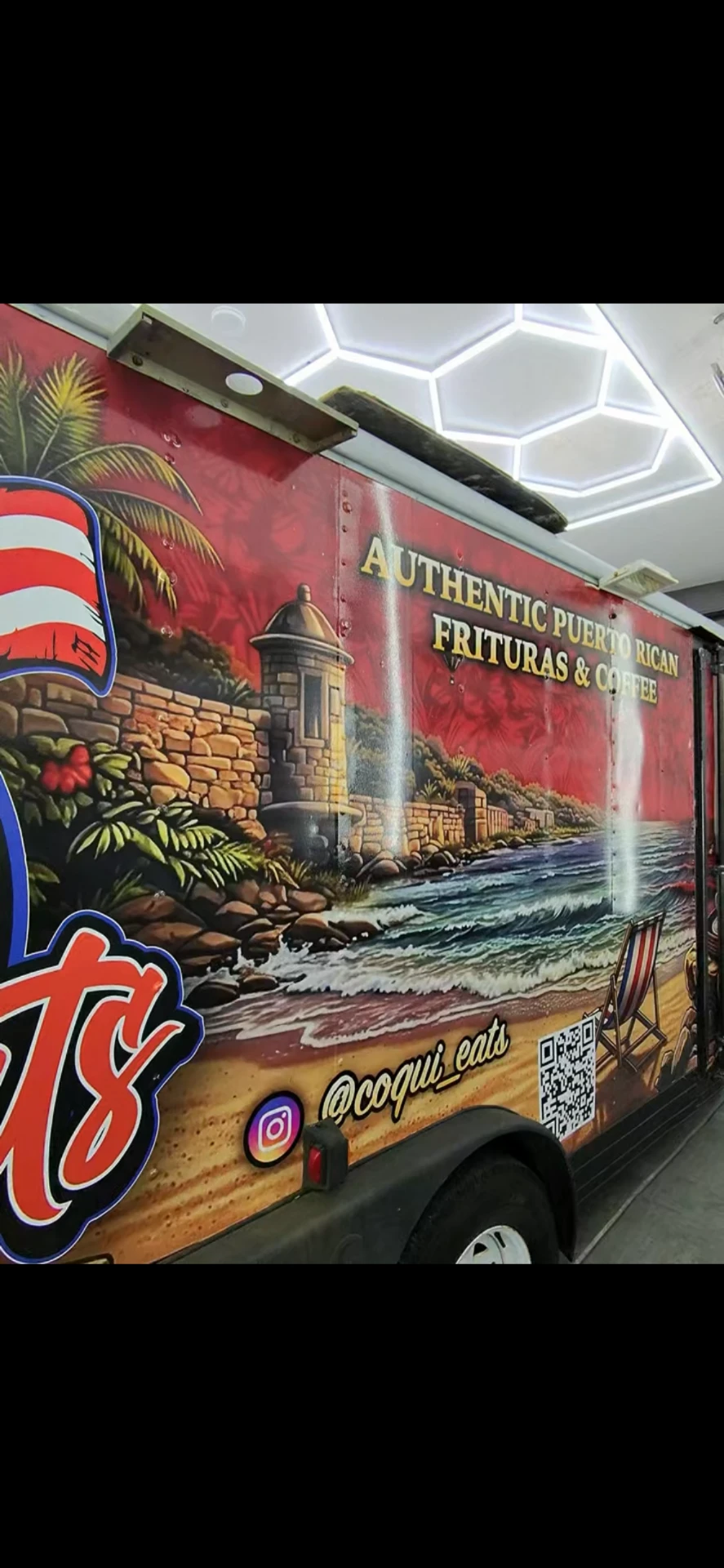 Hand-painted mural on the CoquiEats truck: Authentic Puerto Rican Frituras & Coffee